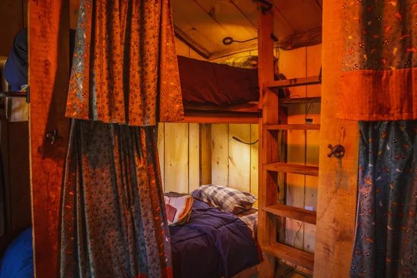 Bunks made up inside the heated bunkhouse