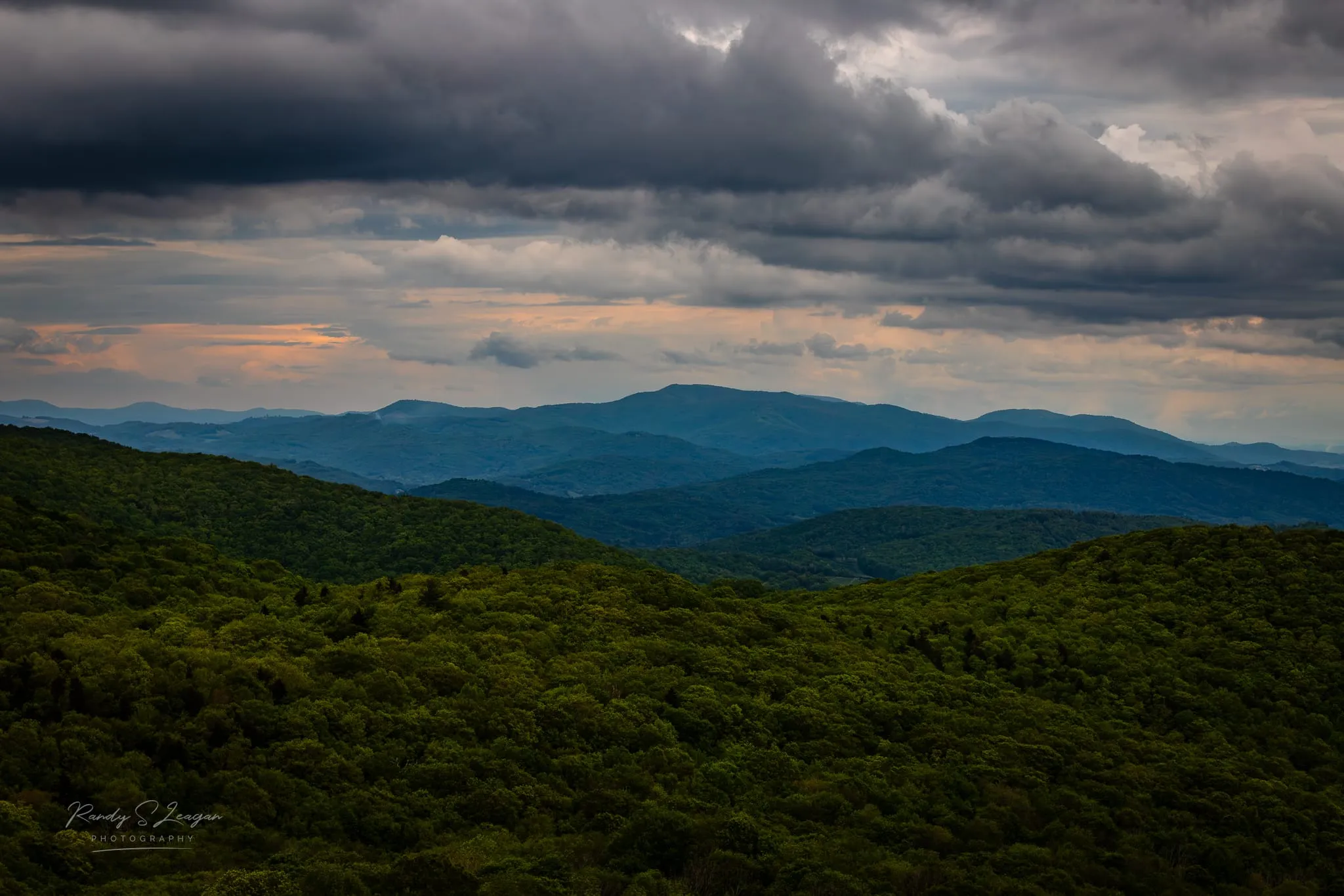 Layered blue ridges and forested slopes seen from the high country near Whitetop, Virginia